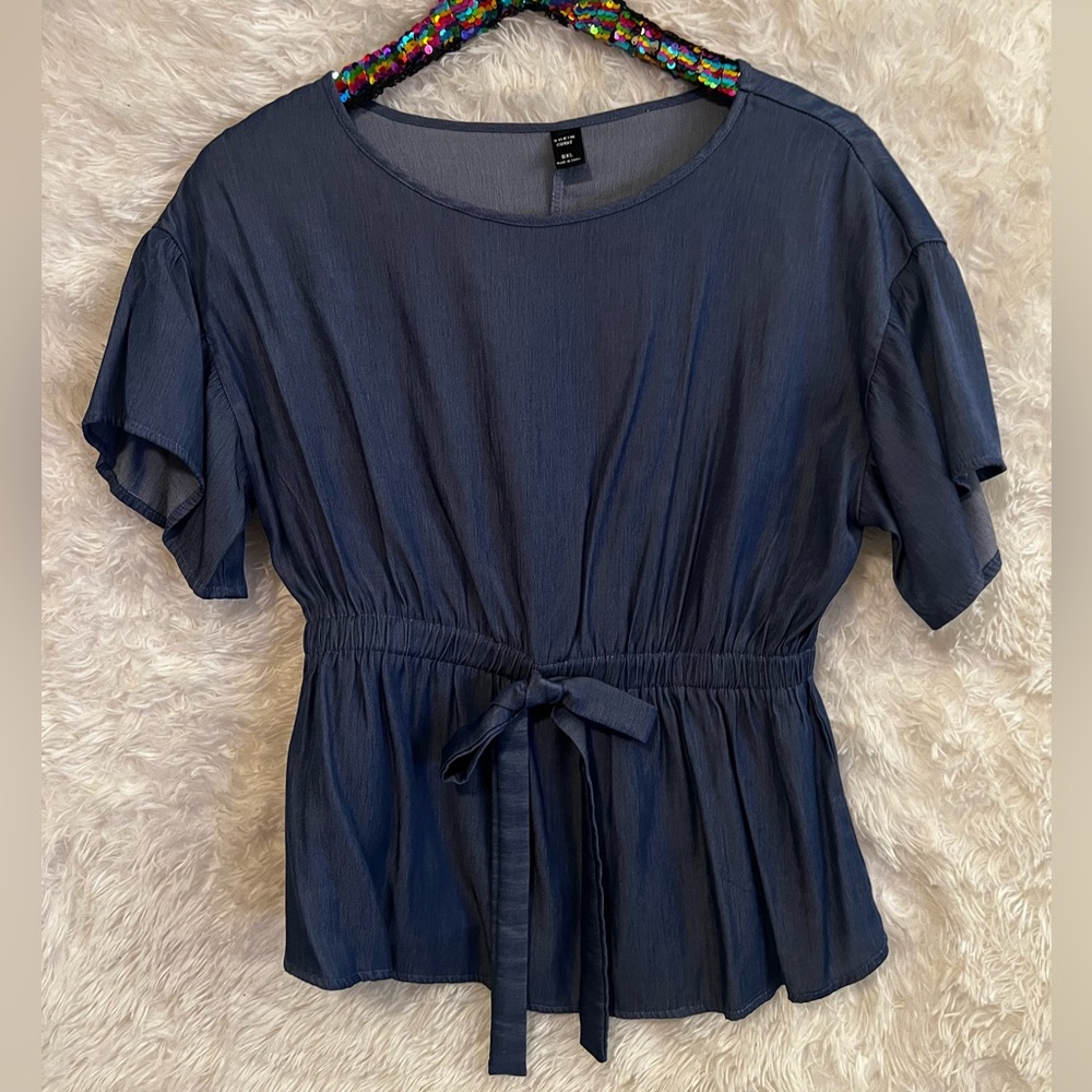 Blue denim like peplum top with tie waist